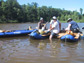 Photo of researchers collecting a sediment core from Silver Lake, Ohio.