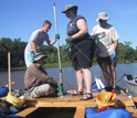 Photo of researchers preparing a platform for collecting sediment
cores from Silver Lake, Ohio.