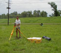 Torbjörn Törnqvist determining the elevation of a GPS-antenna in the Mississippi Delta.