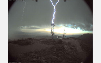 Lightning strike caught on motion-detect camera at HPWREN site