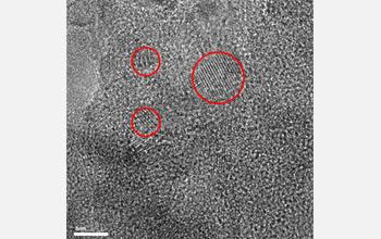 Transmission electron microscopy image of titanium dioxide rafts on a surface of silica.