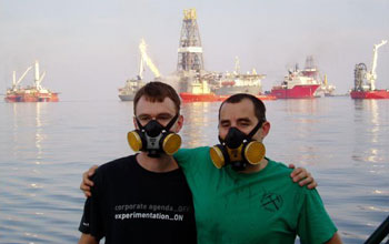 Photo of John Kessler and David Valentine in front of the Deepwater Horizon Gulf oil spill.