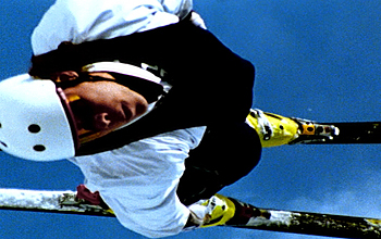 Skier doing an aerial maneuver