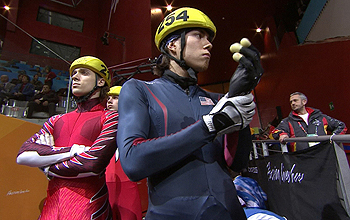 Two athletes in competition suits