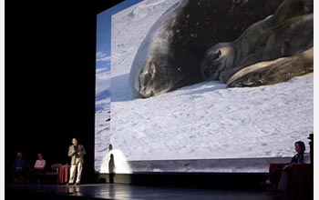 Photo of Randy Davis discussing his research on Weddell seals.
