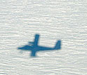 shadow of Twin Otter aircraft