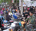 Photo of people riding electric bikes in China.