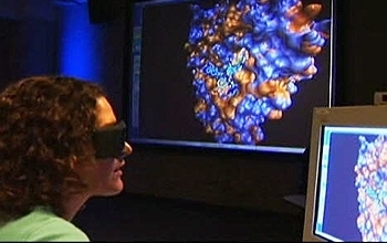 Researchers with special glasses and computerized images