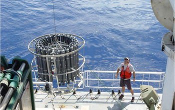Photo of the launch of the instrument rosette that will take ocean water samples.