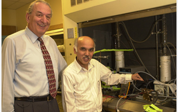 Photo of Nobel Laureate George A. Olah and G. K. Parkash who work together on recycling CO2.