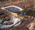 Photo of a weir placed at NSF's Harvard Forest Long-Term Ecological Research site.