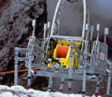 Photo of the legged robot Dante II, which explored and sampled an active volcano.
