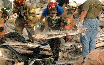 Rescuers clear rubble in Evansville, Ind.