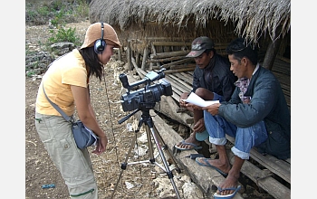 A researcher records language variation on the Indonesian island of Sumba.