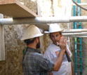 Photo of Zielke and Arrowsmith, both of ASU, standing in the bottom of a San Andreas trench.