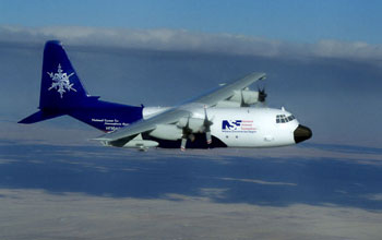 An NSF/NCAR C-130 aircraft in the sky