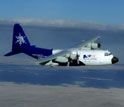 An NSF/NCAR C-130 aircraft in the sky