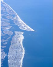 An aerial view of Long Island shows its low-lying shores, vulnerable to sea-level rise effects.