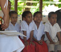 Photo of school children in Tonga in class.