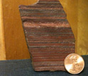 Close-up of a sample of 2.7 billion-year-old iron formation from Zimbabwe; red is hematite.