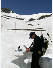 Photo of scientist Tom Painter tracking radiation in June, 2007.
