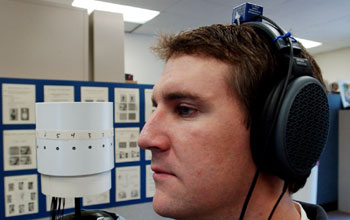 graduate student Robert Dalton listens to an MTB recording