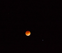 Lunar eclipse and stars in the sky