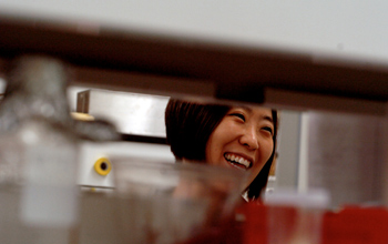 Photo of researcher Cheryl Hayashi in the lab.