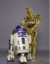 Photo of the famous droids C-3PO and R2-D2 in the Robots and People section of the exhibit.