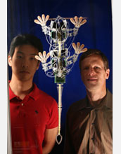 Photo of Sangbae Kim and Mark Cutkosky with the robot stickybot.