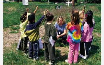 Kristi Cameron holds a science class at Gatorville Outdoor Classroom