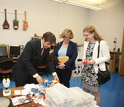 Gavin Garner showing equipment at UVa's lab to NSF's Joan Ferrini-Mundy and Susan Singer.