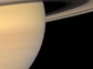 A photo of a natural color view of Saturn and Titan.