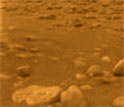 An image of rock-like objects on Titan's surface.