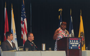 Photo of Kara Hayes, Wounded Warrior, presenting a Transition Success Story.