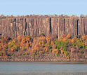 View of Palisade Sill near Alpine, N.J., from across a river.