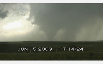 Genesis and evolution of a rain-wrapped tornado observed by VORTEX2 teams in southeastern Wyoming.