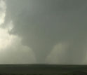 Genesis and evolution of a rain-wrapped tornado observed by VORTEX2 teams in southeastern Wyoming.