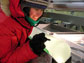 A scientist examines an ice core in West Antarctica