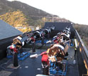 Photo of the MEarth telescopes at Mt. Hopkins, Arizona.