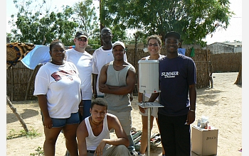 American and Senegalese graduate students installed a rain gauge in Kawsara, Senegal.