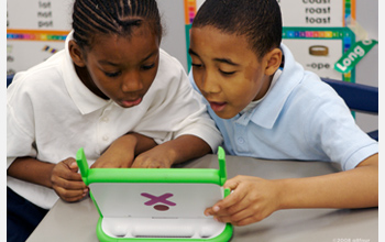 Photo of two boys working together on a Memorize activity in a fifth-grade class.