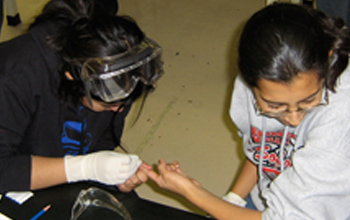 girl getting finger pricked