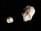artist's rendering of an asteroid pair