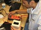 student working on a CubeSat
