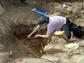 photo of woman excavating