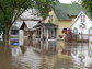 flooded street and houses in Cedar Rapids, Iowa