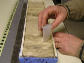 scientists sampling a deep-sea sediment core