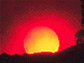 photo of a red sun on the horizon