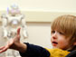 a little boy the humanoid robot can help